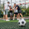 close-up-of-football-ball-on-green-field-players-going-to-playing-together (1) Close up of football ball on green field.. Players going to playing together..